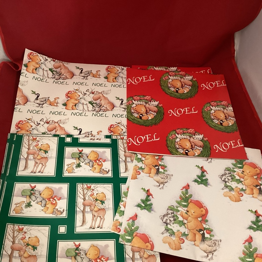 Various sizes of Christmas themed wrapping paper for junk journal
